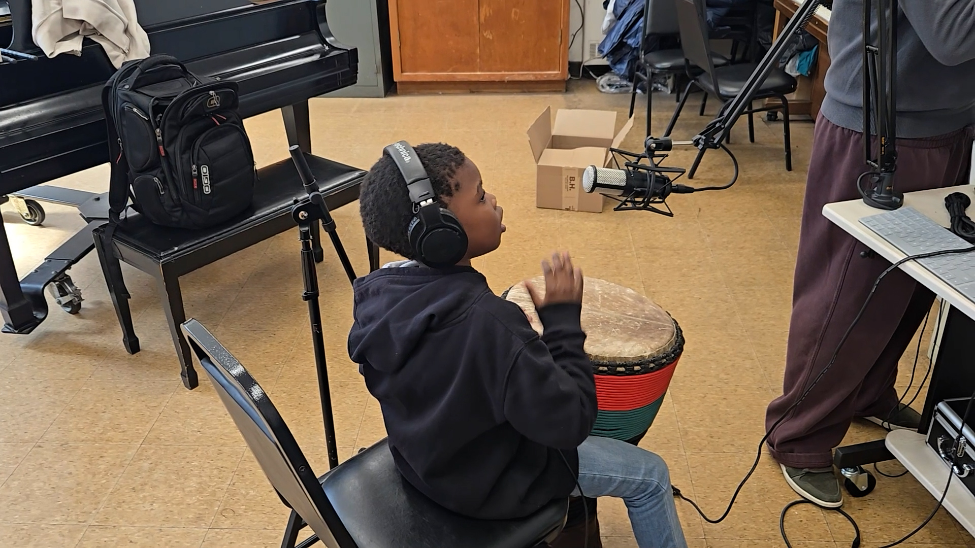 Documentary production film still showing a live creative session with youth for Creative House for Young Creatives.